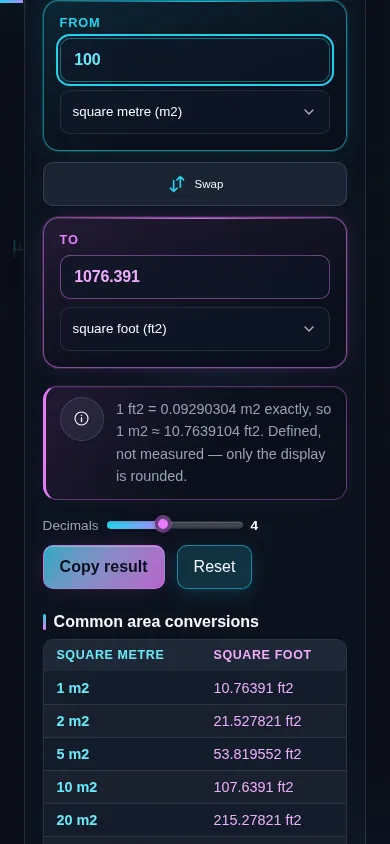 The area converter on a phone screen, the two panes stacked with the swap control between them.
